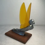 Gorgeous Original Flying Goddess Hood Ornament Amber Wings Light Up With Stand. Fixed Price $600.00.