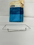 1975-1977 Ford Granada Gas Filler Door Spring D6DZ-66405A24-B. Fixed Price $7.50.