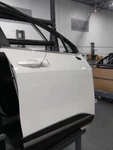 Passenger Front Door Korea Built Light Tint Glass Fits 23-24 Sportage 491395. Fixed Price $1165.83.