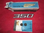 1960'S Gm Chevrolet 350 Emblem Nos Oem PT3963234. Fixed Price $75.00.