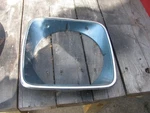 1975 Ford Torino Elite Headlight Cover. Fixed Price $10.00.