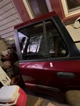 02-04 Gmc Envoy Driver Left Rear Side Door Extends Into Wheel Well Red. Fixed Price $125.00.
