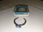 Cadillac Wreath Rear Quarter Emblem N.o.s. 20172332 Or #25544211 1980-1995. Fixed Price $15.95.