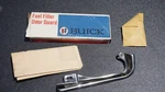 Nos Gm 1966 1967 Buick Station Wagon Fuel Gas Tank Filler Door Guard 981100. Fixed Price $21.00.