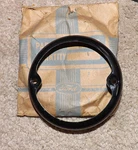 Nos 1933-48 Ford Tail Light Door # 40-13448. Fixed Price $15.00.