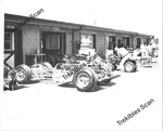 Indycar Roadster Chassis At Indianapolis Motor Speedway Garage 8X10 Photo (120). Fixed Price $12.95.