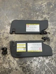 2011-2016 Ford F250 Lariat Front Sun Visors. Fixed Price $160.00.