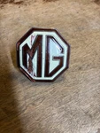 Cream Grille Badge For Mgtc Spare Tire Emblem Damage. Fixed Price $15.00.